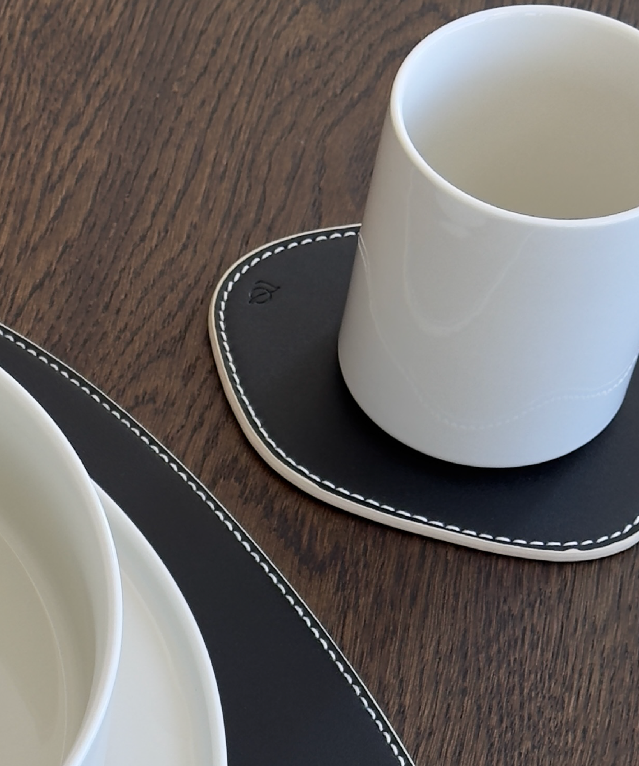 Asymmetrical reversible black/beige faux leather coasters | Jade