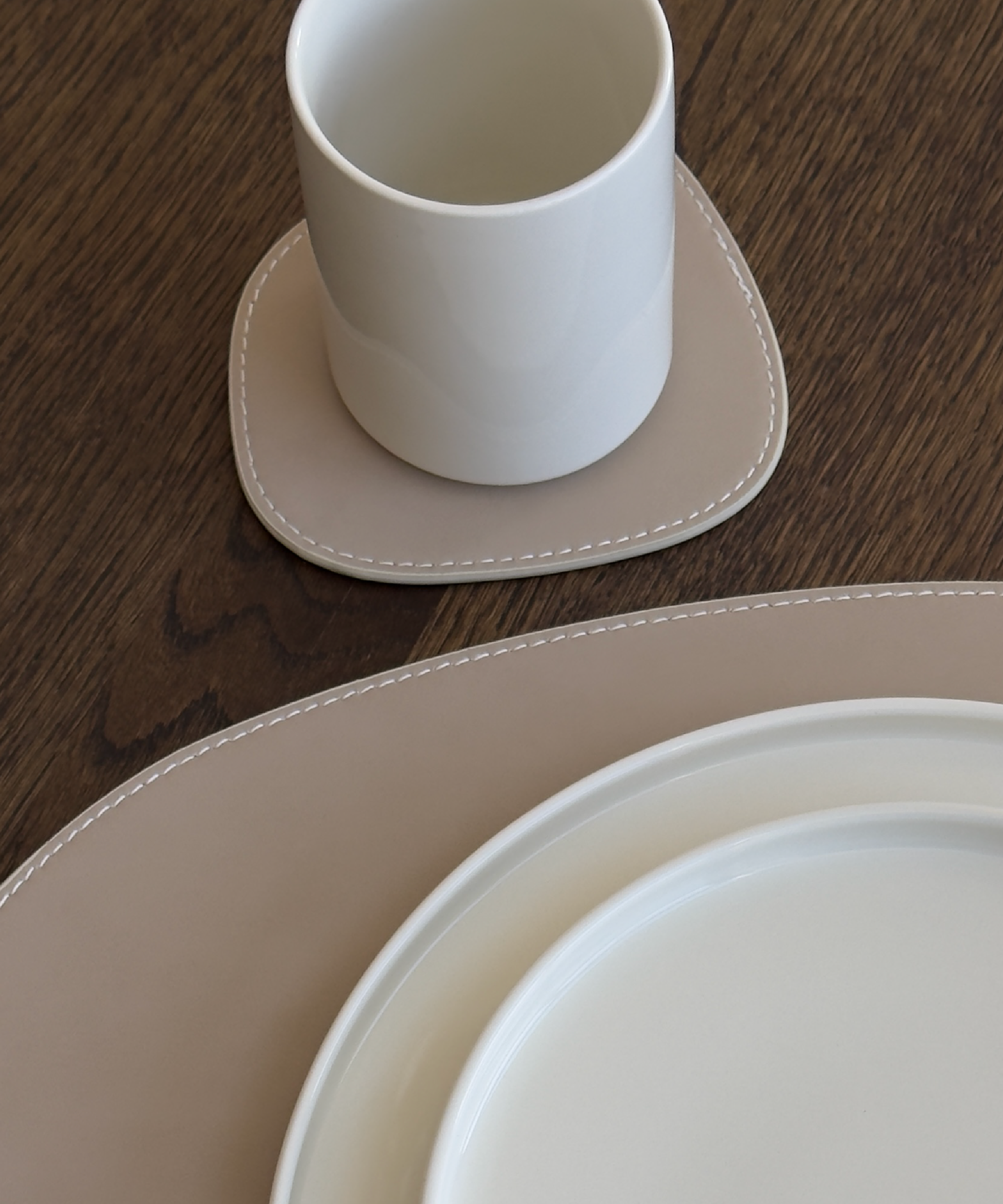 Asymmetrical reversible taupe/cream faux leather coasters | Jade