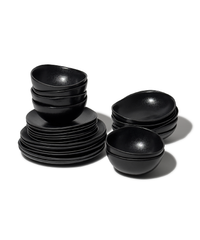 Handmade black ceramic tableware set in organic shape