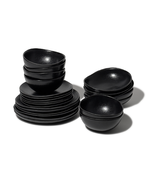 Handmade black ceramic tableware set in organic shape