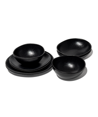 Handmade black ceramic tableware set in organic shape